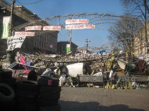 One last good look at a Euromaidan barricade, with clear messages at the top ('Yanukovich - Killer,' 'Berkut - Killer,' 'Party of Regions - Killer')